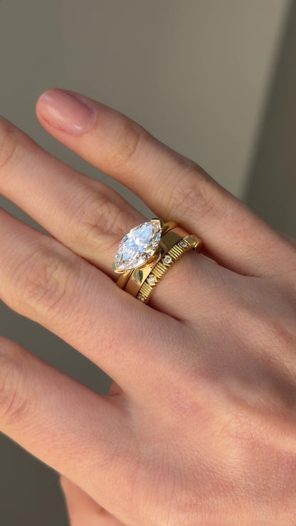 MARQUISE SEMI BEZEL SOLITAIRE